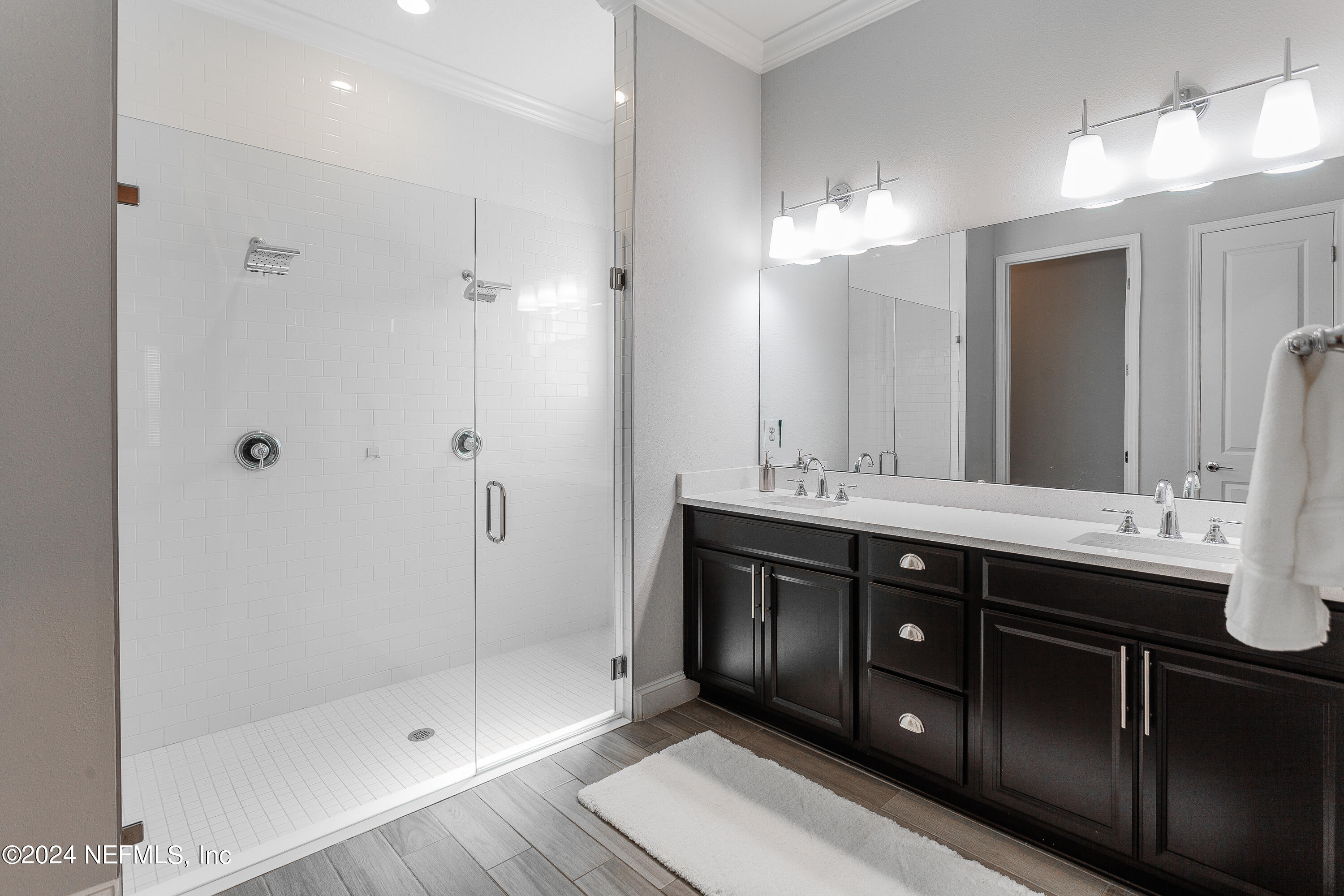 175 Caribbean Place St. Johns, FL 32259 - Photo 23 of 41 a bathroom with a double vanity sink shower and a mirror