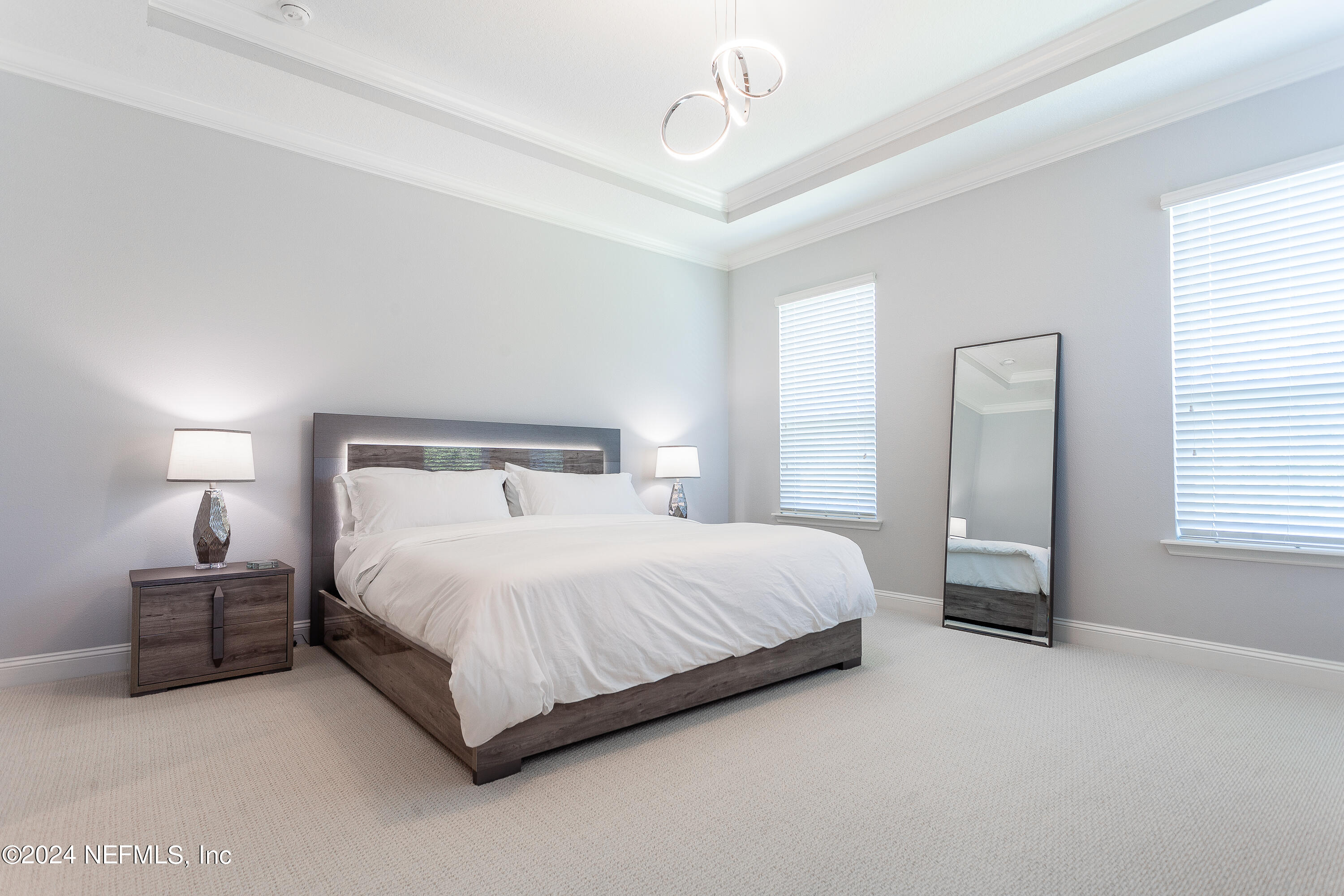 175 Caribbean Place St. Johns, FL 32259 - Photo 26 of 41 a bedroom with a bed and a window