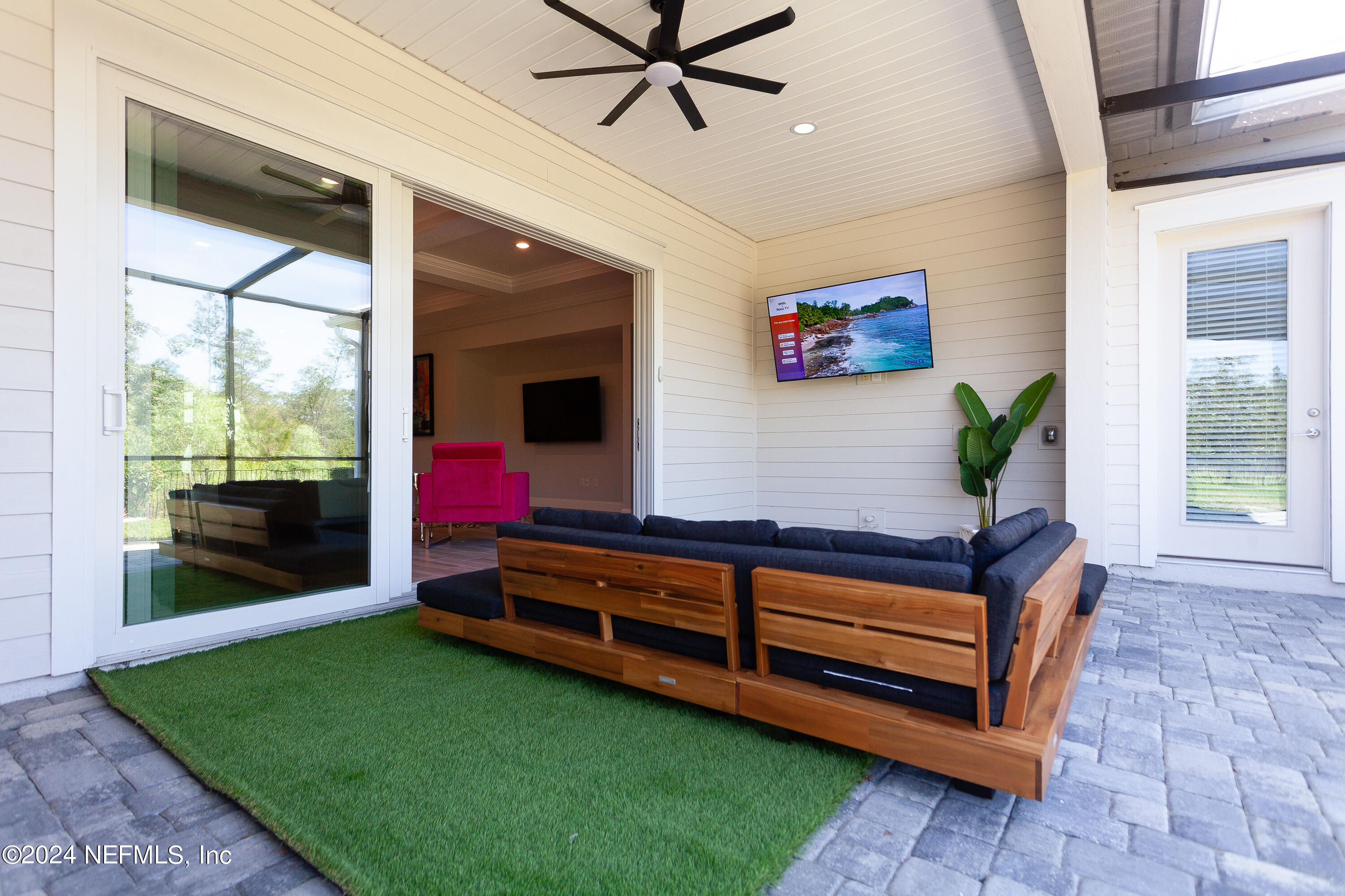 175 Caribbean Place St. Johns, FL 32259 - Photo 30 of 41 a living room with pool table furniture and a floor to ceiling window