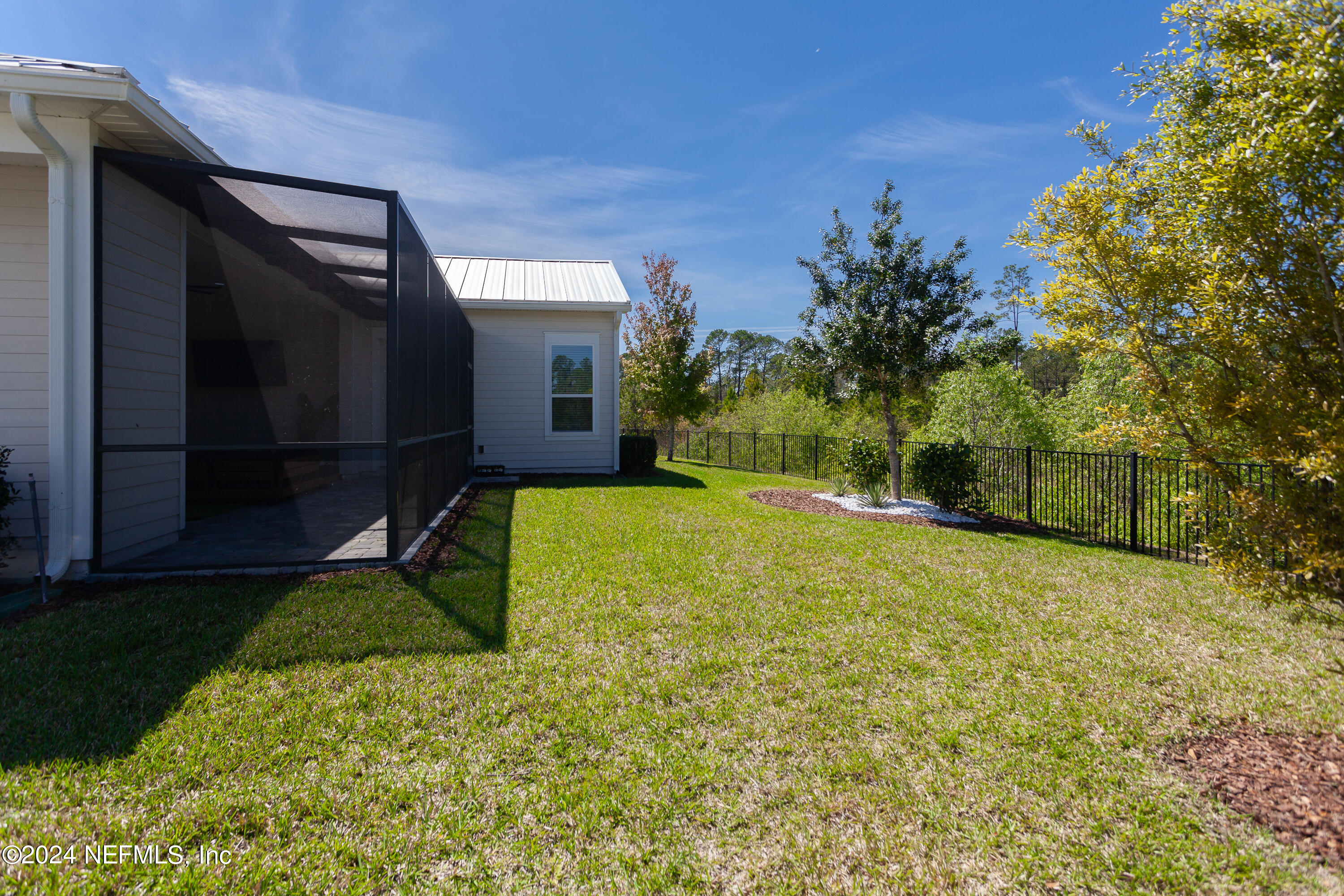 175 Caribbean Place St. Johns, FL 32259 - Photo 34 of 41 a view of a backyard with a garden