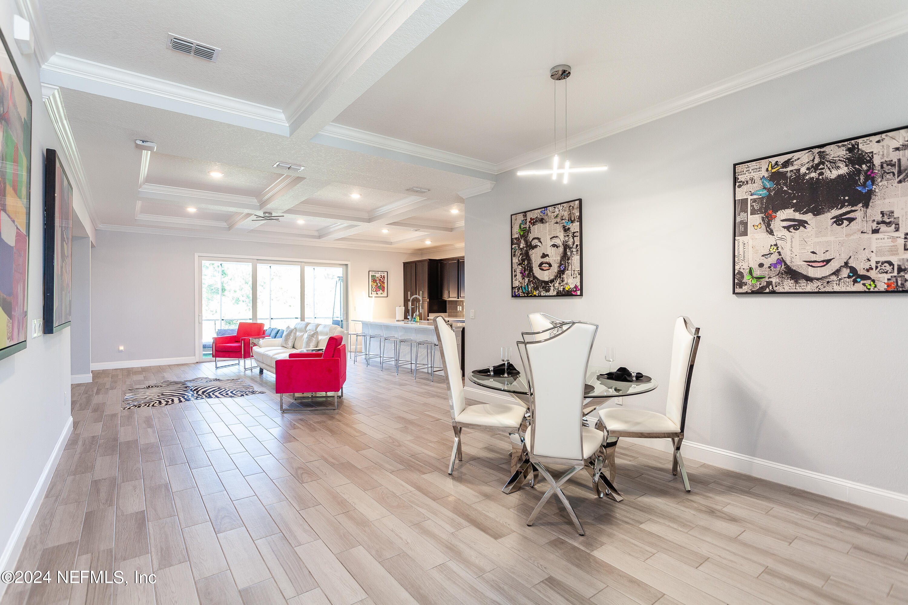 175 Caribbean Place St. Johns, FL 32259 - Photo 5 of 41 a view of a dining room with furniture and wooden floor