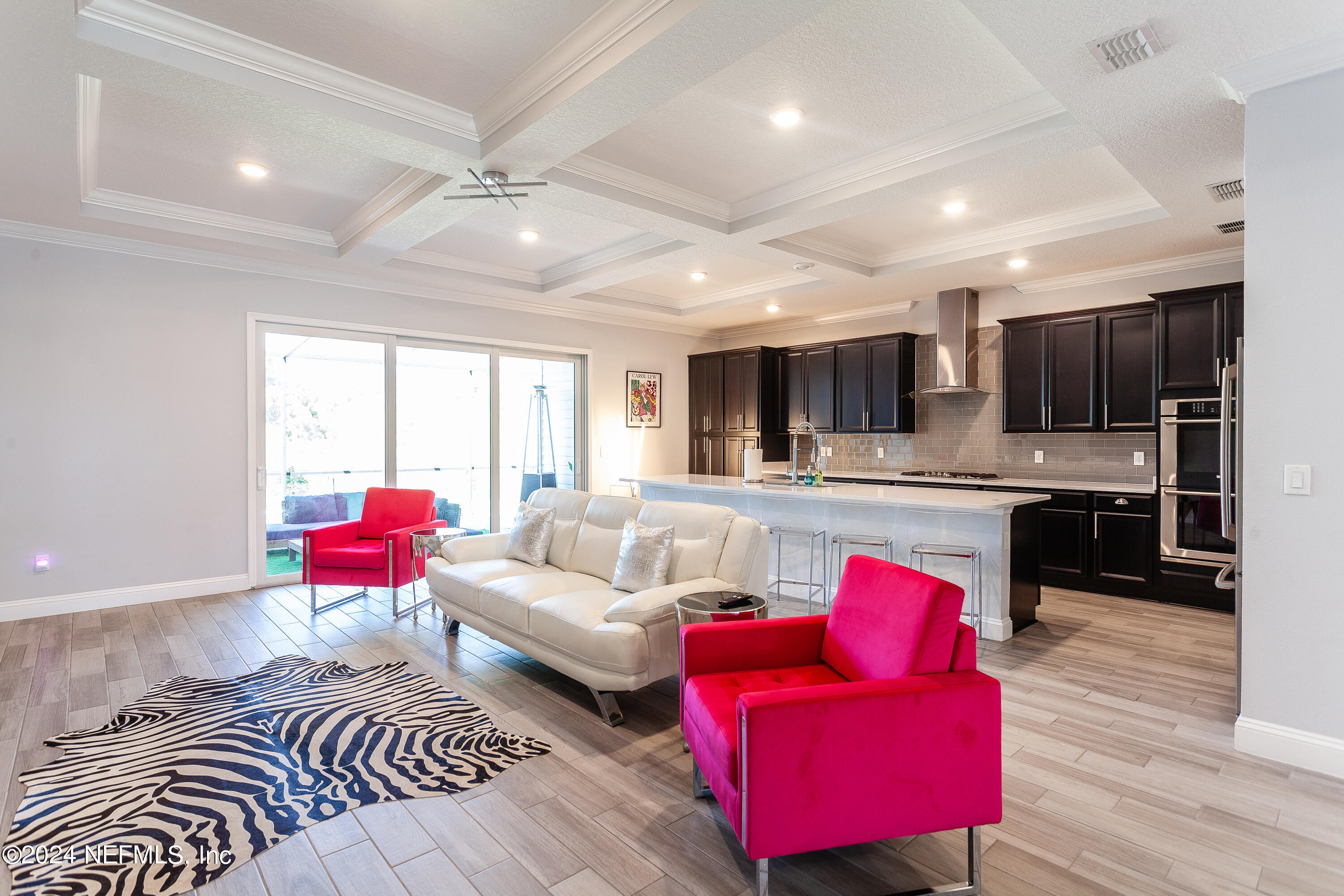 175 Caribbean Place St. Johns, FL 32259 - Photo 7 of 41 a living room with furniture and kitchen view