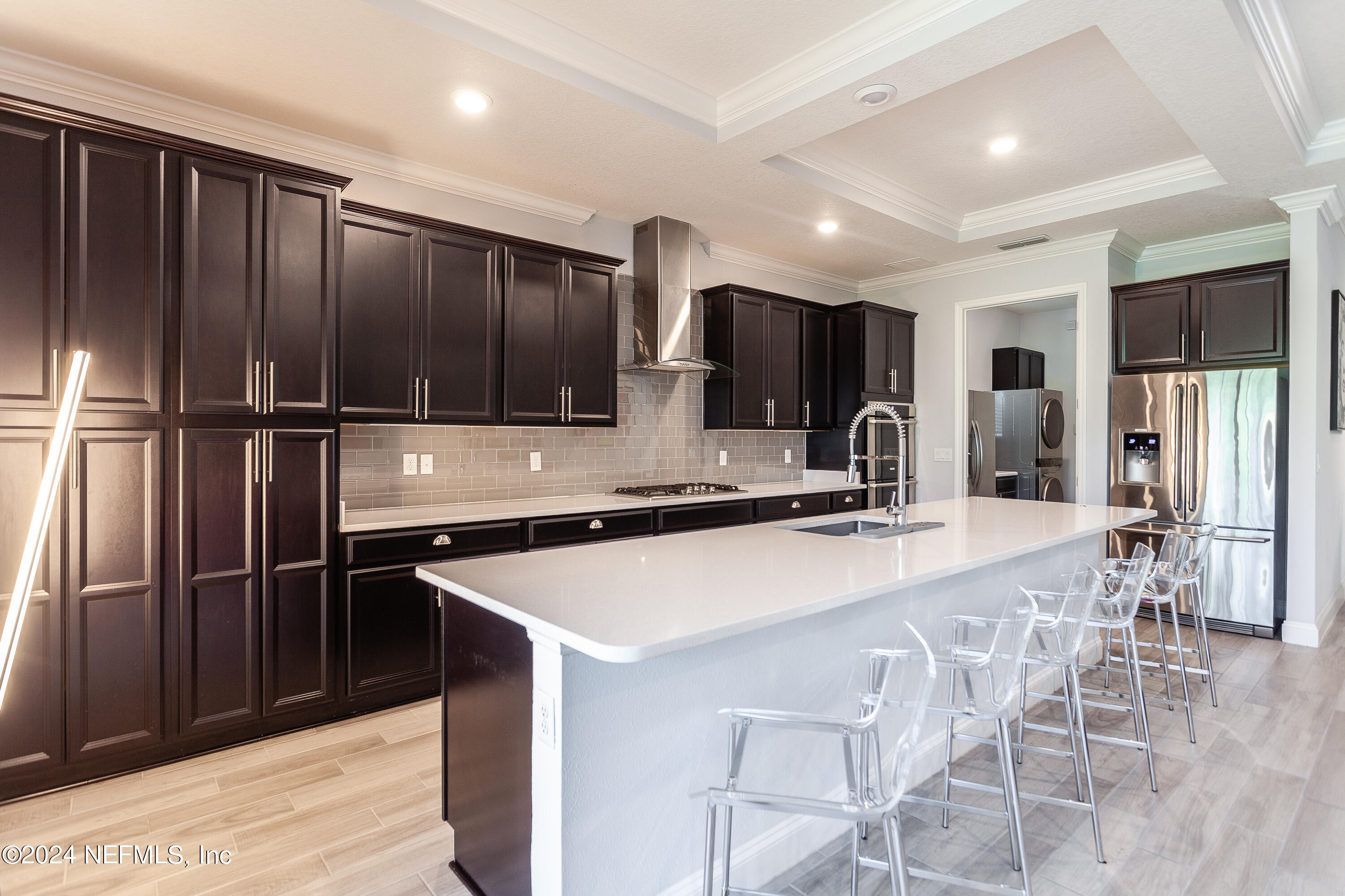 175 Caribbean Place St. Johns, FL 32259 - Photo 10 of 41 a kitchen with stainless steel appliances a refrigerator and a sink