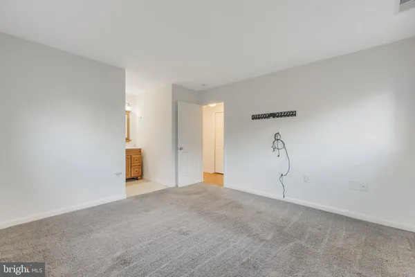 a view of a room with rack on the wall