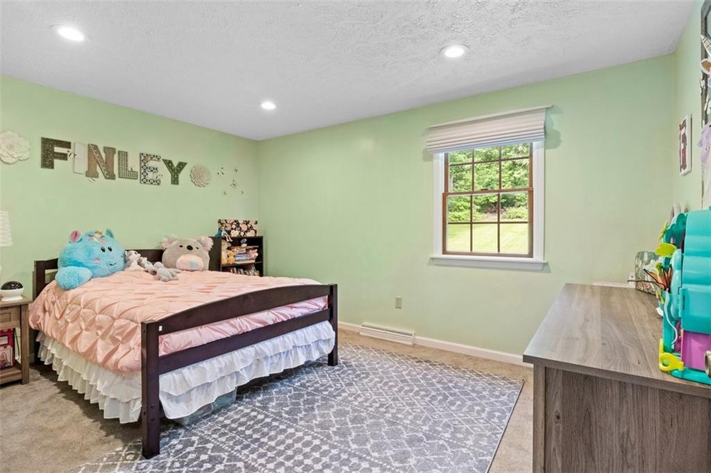 112 Sandy Hill Road Valencia, PA 16059 - Photo 17 of 24 a bedroom with a bed and a window