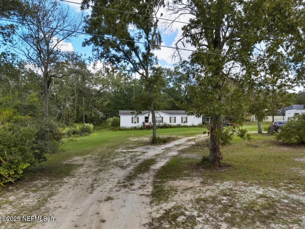 1886 Gentlebreeze Road Middleburg, FL 32068 - Photo 14 of 15 a view of a park that has large trees