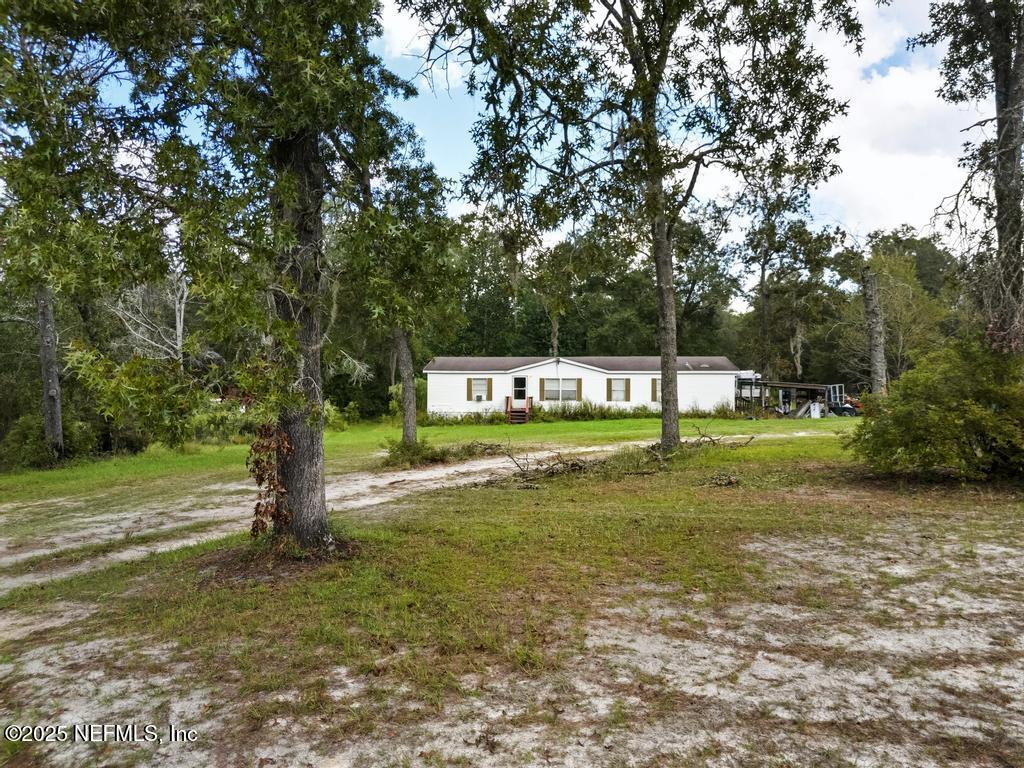 1886 Gentlebreeze Road Middleburg, FL 32068 - Photo 15 of 15 a view of a park that has large trees