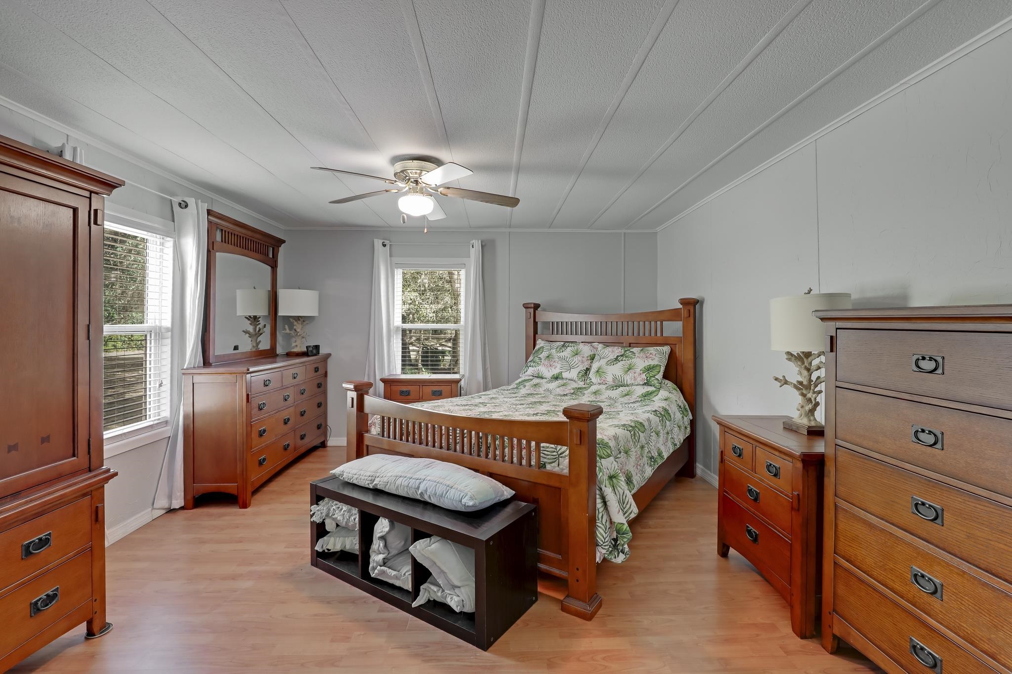 6901 Catlett Road St. Augustine, FL 32095 - Photo 20 of 74 Bedroom with light wood finished floors, ceiling fan, and crown molding