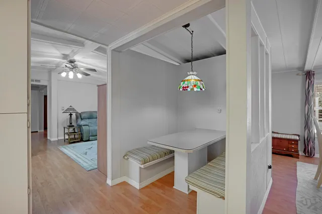 a bedroom with furniture and a window