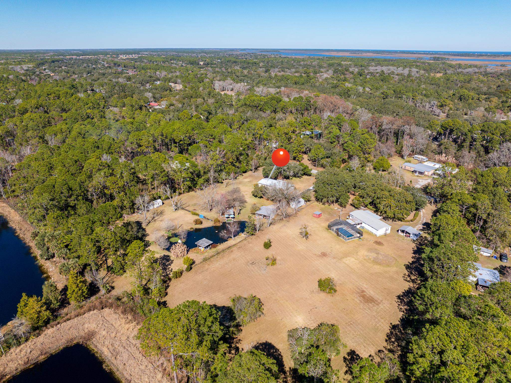 6901 Catlett Road St. Augustine, FL 32095 - Photo 72 of 74 Aerial view of property and surrounding area with a large body of water