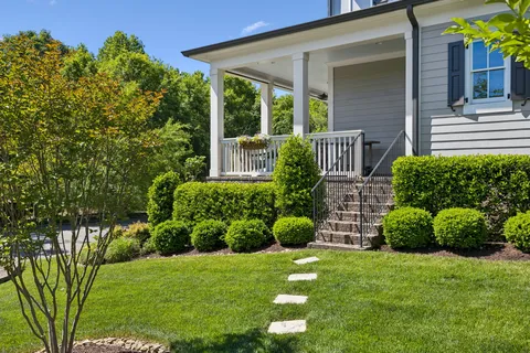 a view of a house with a garden
