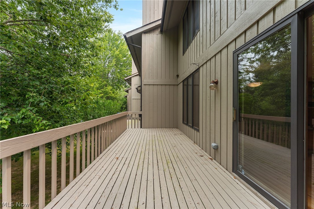 5741 Som Center Road, Unit 1 Solon, OH 44139 - Photo 39 of 50 Expansive outdoor deck featuring wood flooring and a perimeter railing