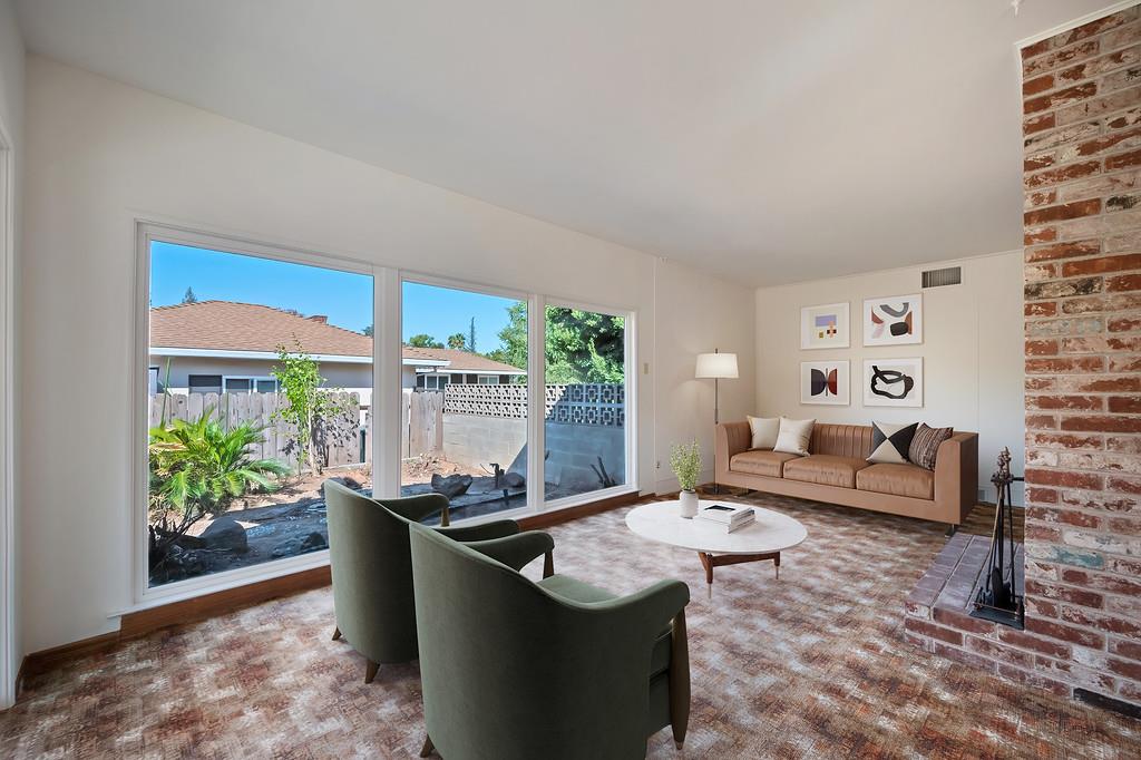 1056 Entrada Road Sacramento, CA 95864 - Photo 18 of 57 a living room with furniture and a potted plant
