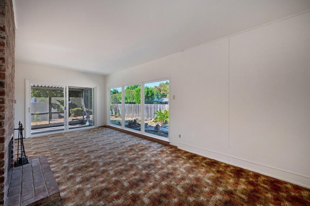 1056 Entrada Road Sacramento, CA 95864 - Photo 22 of 57 a view of a room with wooden floor and a window