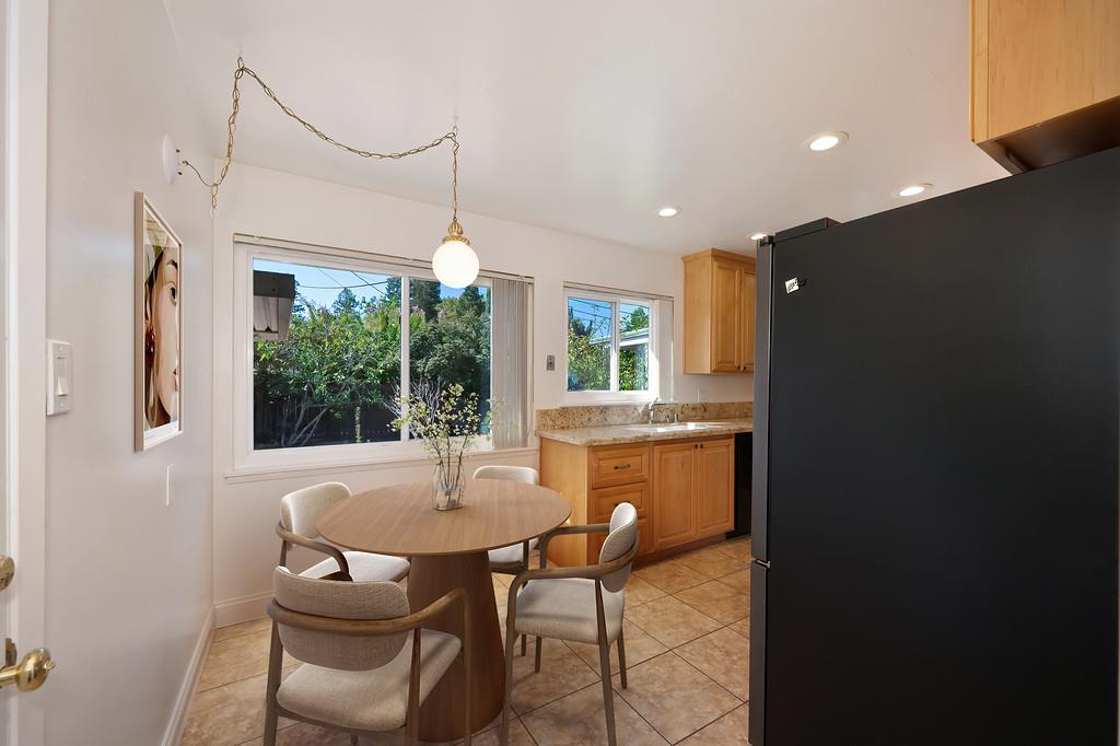 1056 Entrada Road Sacramento, CA 95864 - Photo 29 of 57 a dining room with furniture and window