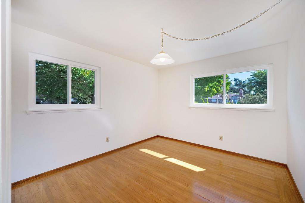 1056 Entrada Road Sacramento, CA 95864 - Photo 33 of 57 an empty room with a window