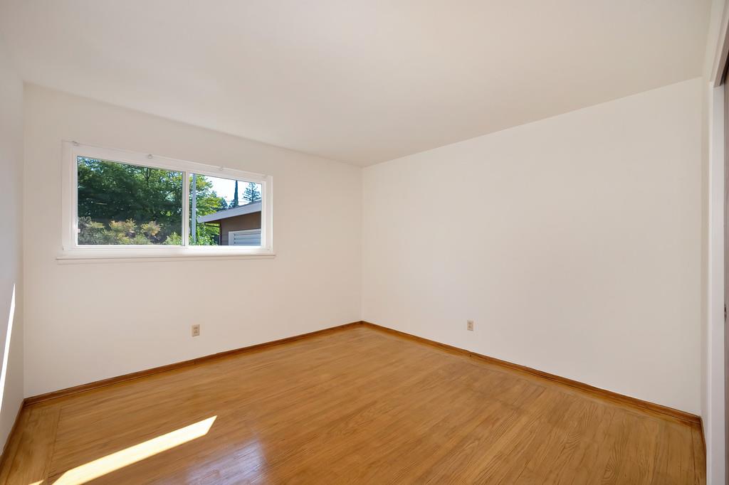1056 Entrada Road Sacramento, CA 95864 - Photo 35 of 57 an empty room with a window