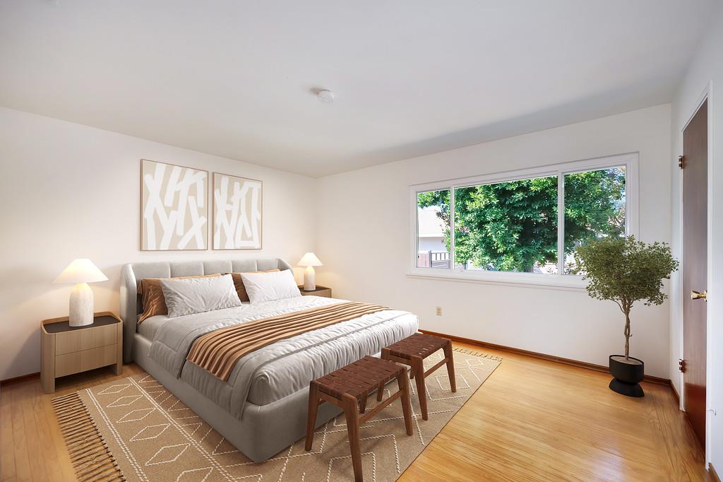 1056 Entrada Road Sacramento, CA 95864 - Photo 37 of 57 a bedroom with a bed and a potted plant