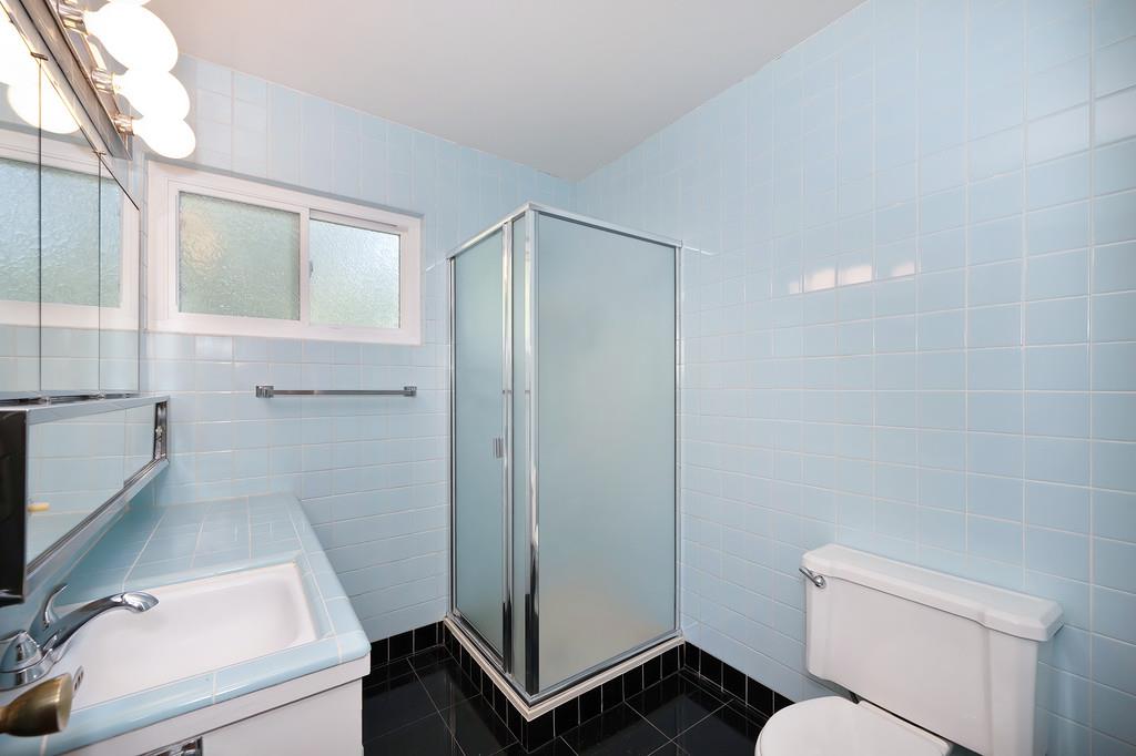 1056 Entrada Road Sacramento, CA 95864 - Photo 41 of 57 a bathroom with a toilet and a sink