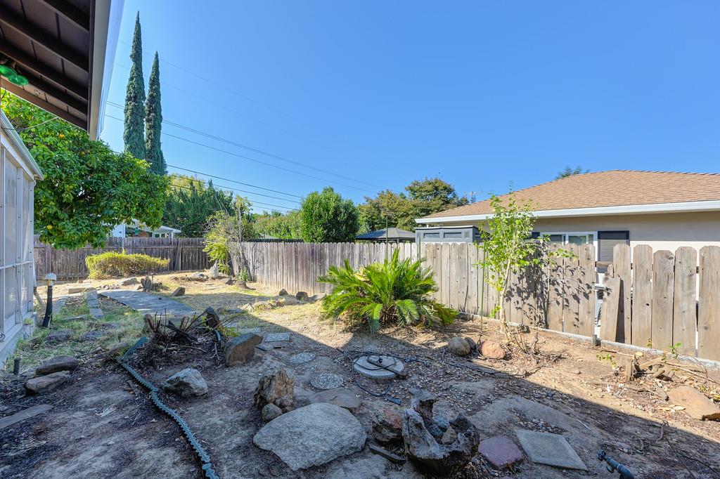 1056 Entrada Road Sacramento, CA 95864 - Photo 48 of 57 a view of a backyard with plants and patio