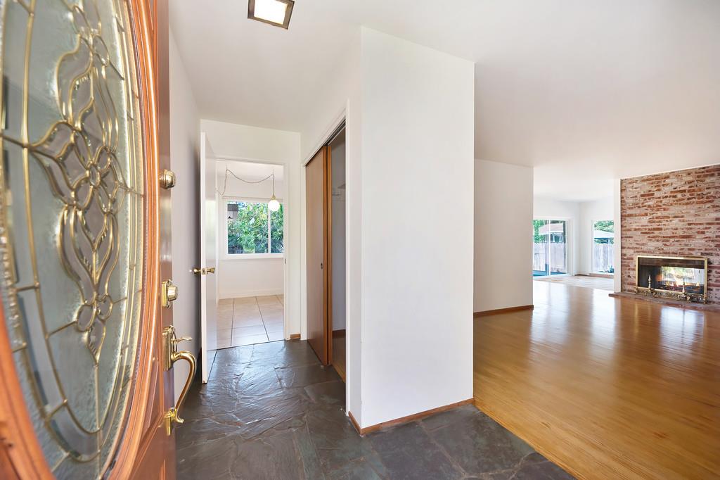 1056 Entrada Road Sacramento, CA 95864 - Photo 9 of 57 a view of a livingroom with furniture and hardwood floor