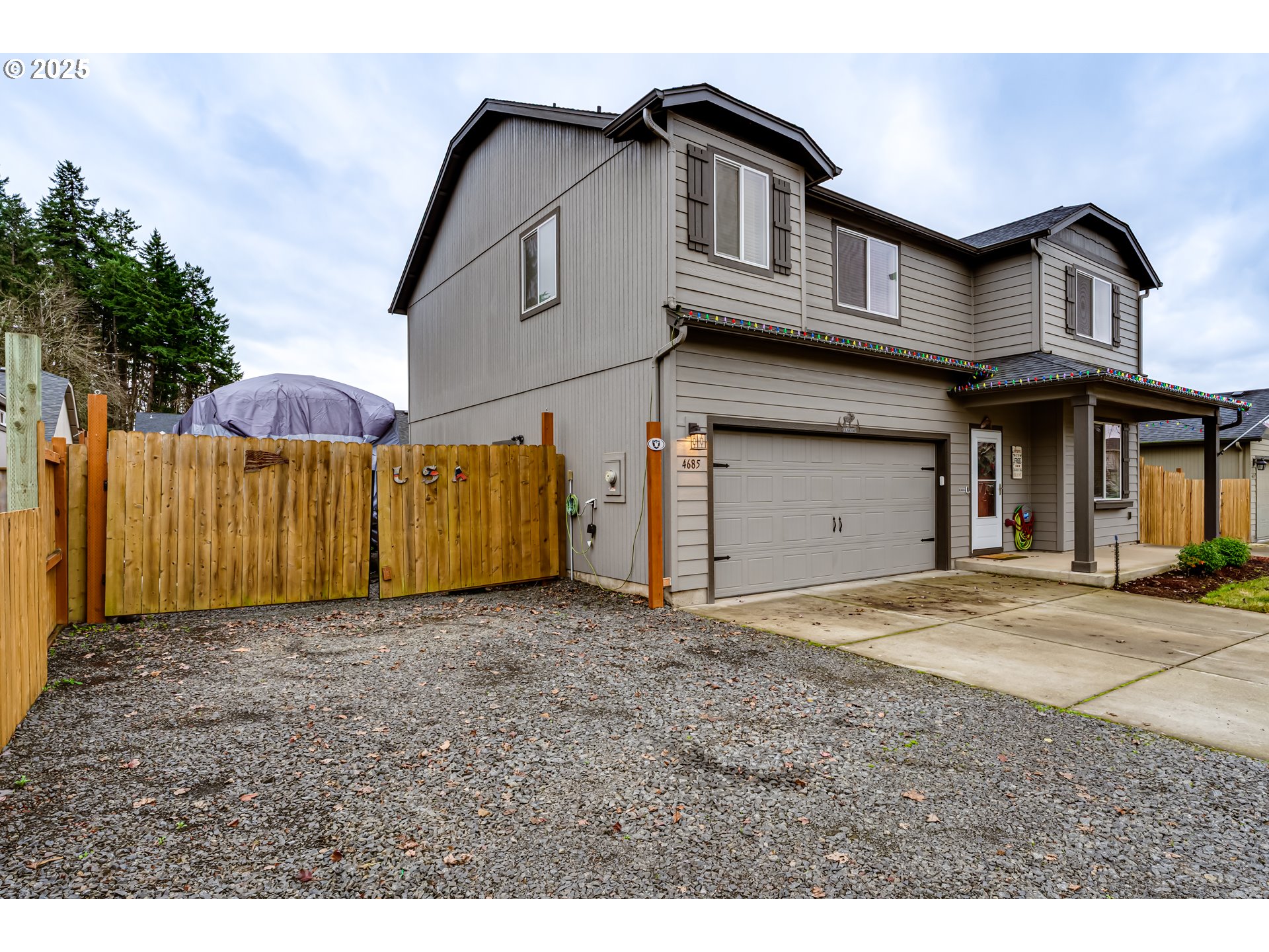 4685 Glacier Meadows Loop Springfield, OR 97478 - Photo 17 of 28 a view of a house with a yard