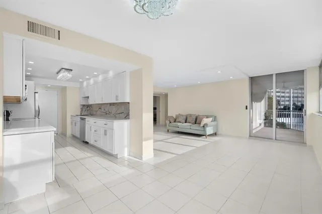 a view of a kitchen with a sink