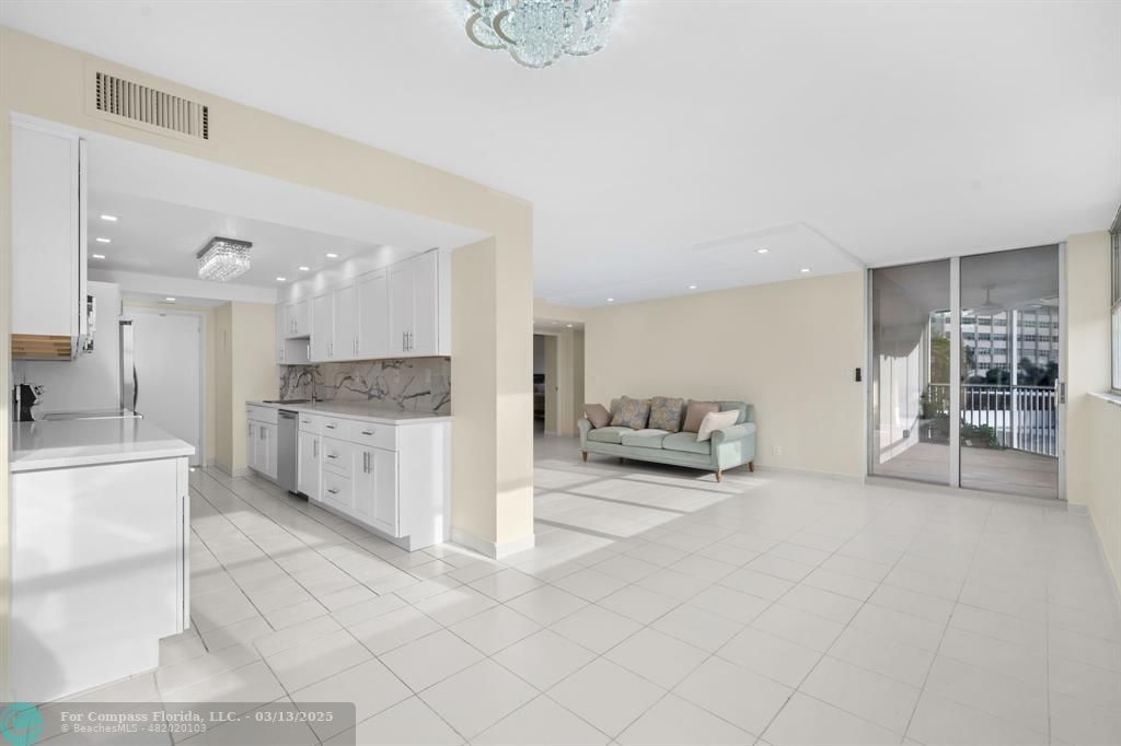 100 Golden Isles Drive, Unit 313 Hallandale Beach, FL 33009 - Photo 26 of 33 a view of a kitchen with a sink