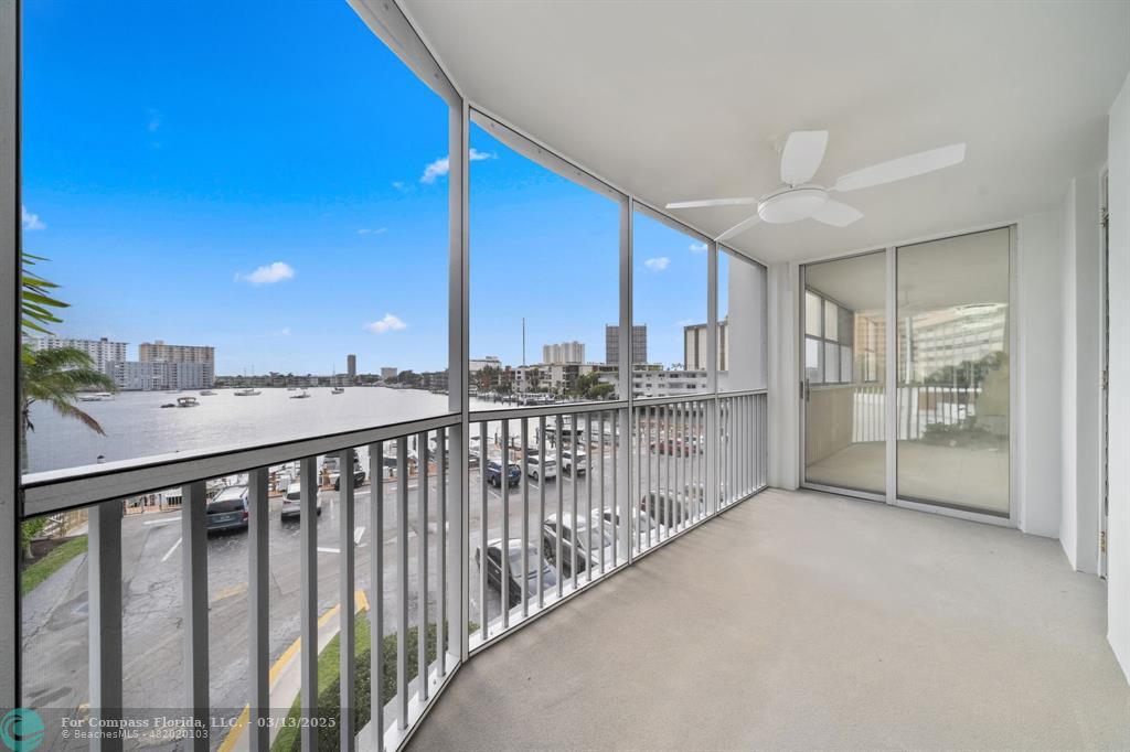 100 Golden Isles Drive, Unit 313 Hallandale Beach, FL 33009 - Photo 28 of 33 a view of a kitchen with a sink and cabinets