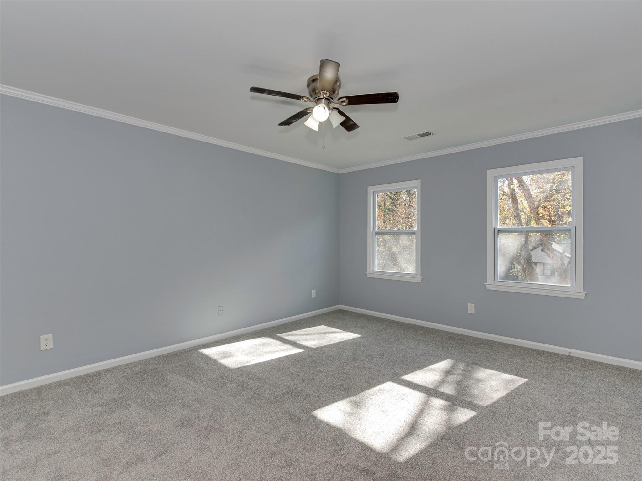 7413 Lockmont Drive Charlotte, NC 28212 - Photo 22 of 42 a view of an empty room with a window
