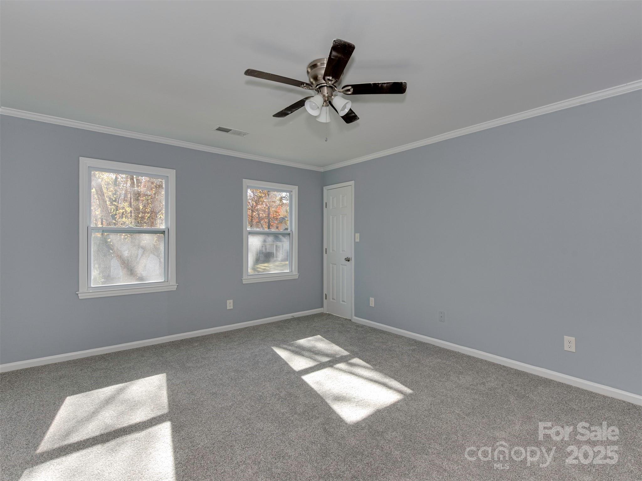 7413 Lockmont Drive Charlotte, NC 28212 - Photo 23 of 42 a view of empty room with window