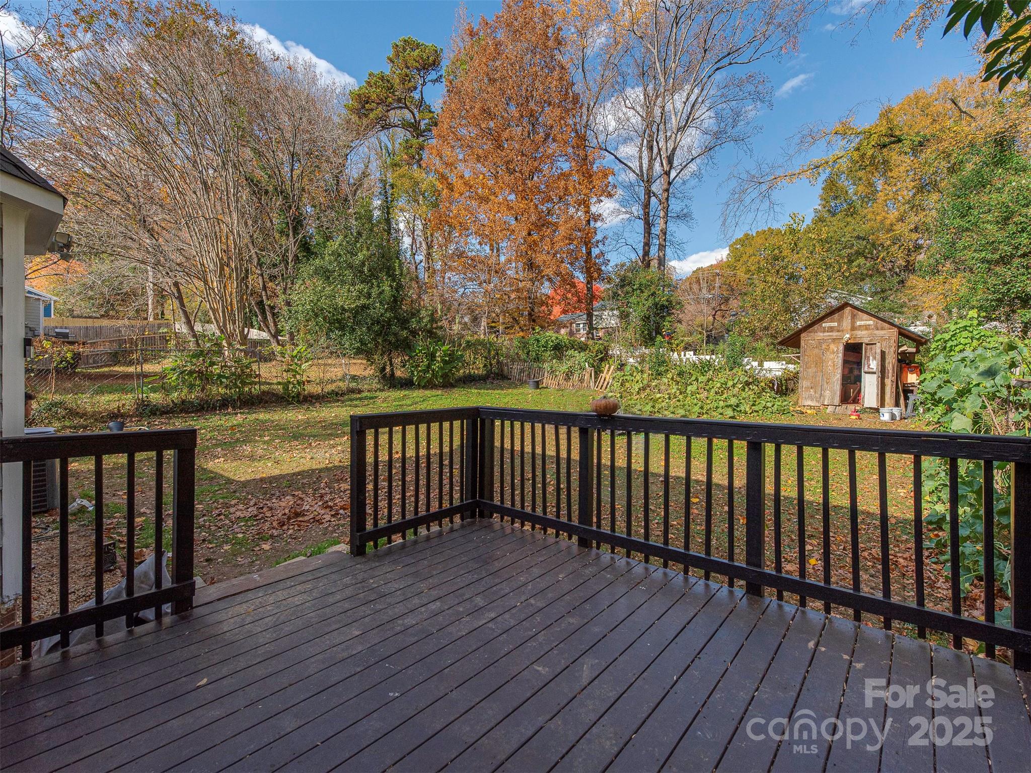 7413 Lockmont Drive Charlotte, NC 28212 - Photo 34 of 42 a view of a wooden roof deck