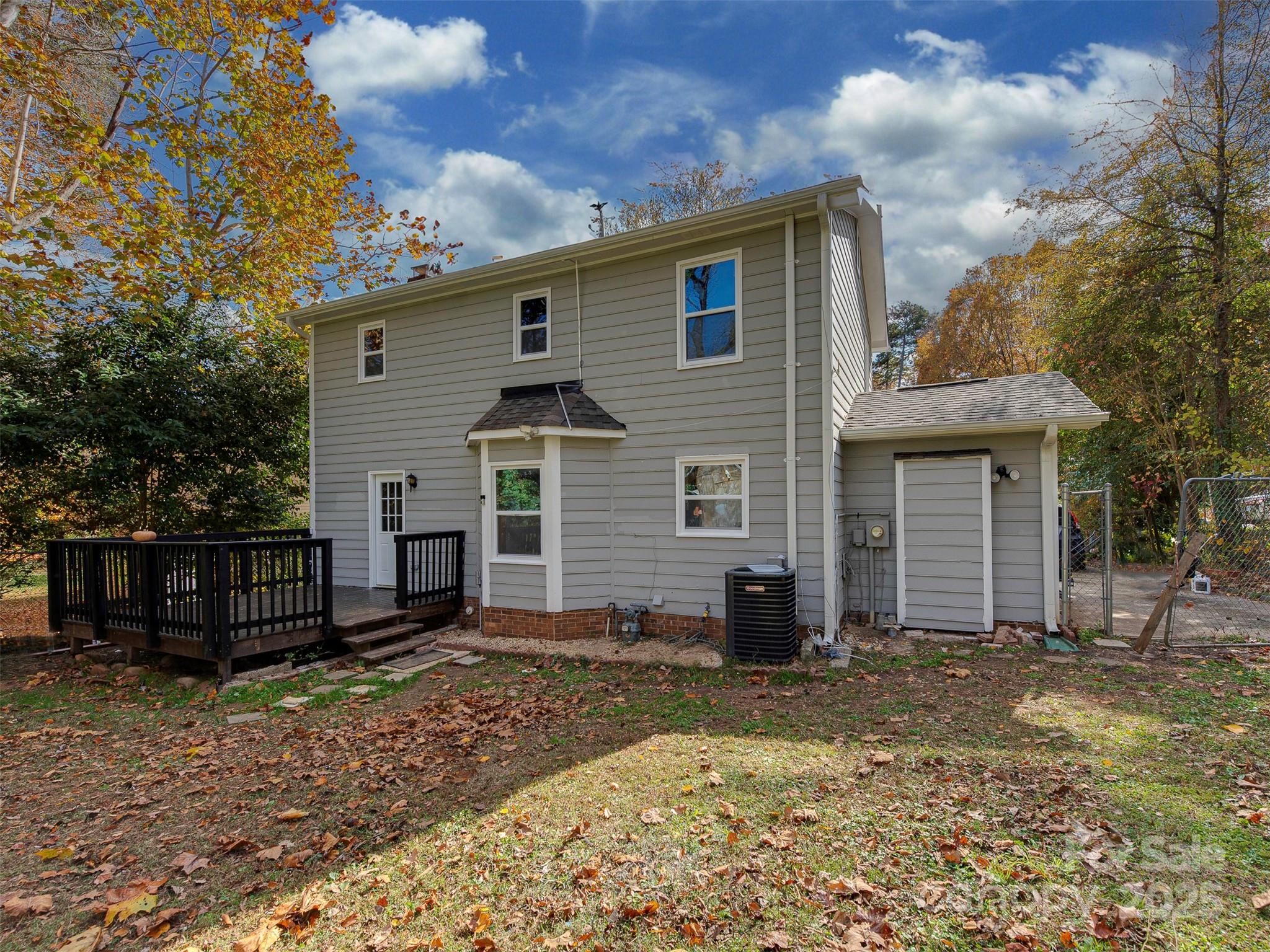 7413 Lockmont Drive Charlotte, NC 28212 - Photo 40 of 42 a view of a house with a yard and sitting area