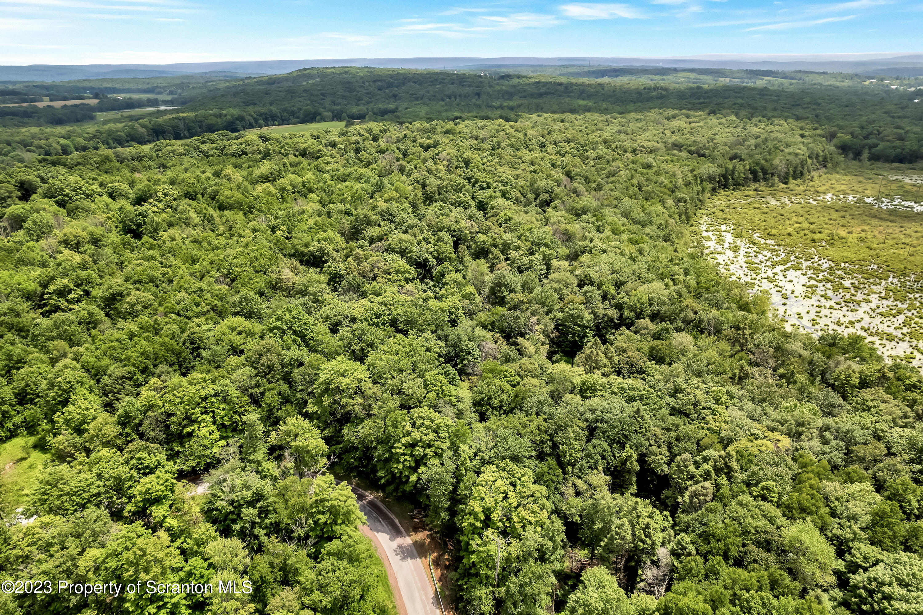 0 Wallace Road Lake Ariel, PA 18436 - Photo 15 of 26 a view of a field with an ocean
