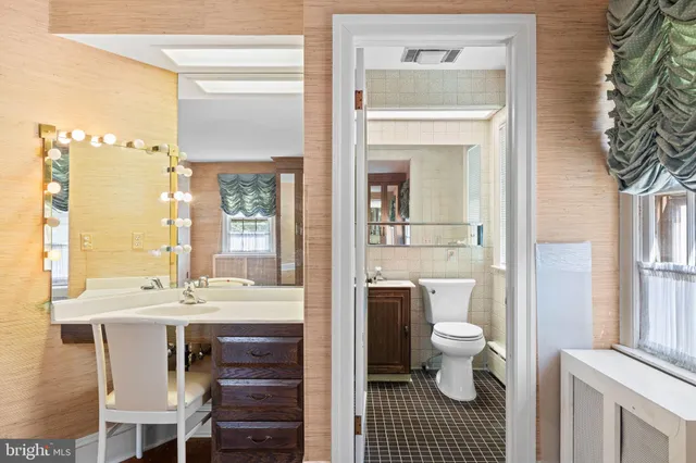 a view of hallway with wooden floor