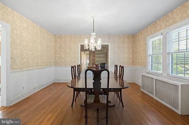 a bathroom with a sink and a window