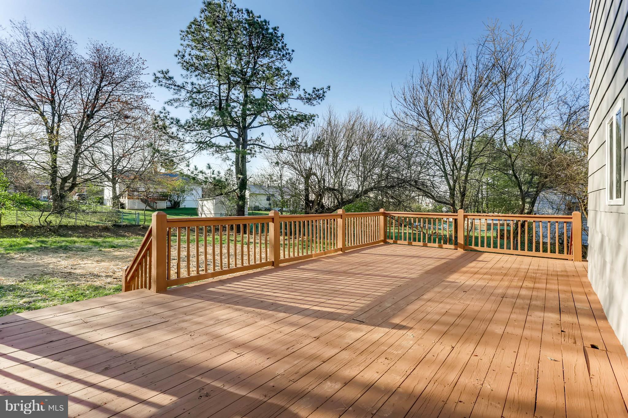 3935 Nemo Road Randallstown, MD 21133 - Photo 20 of 23 a view of backyard with wooden floor and fence