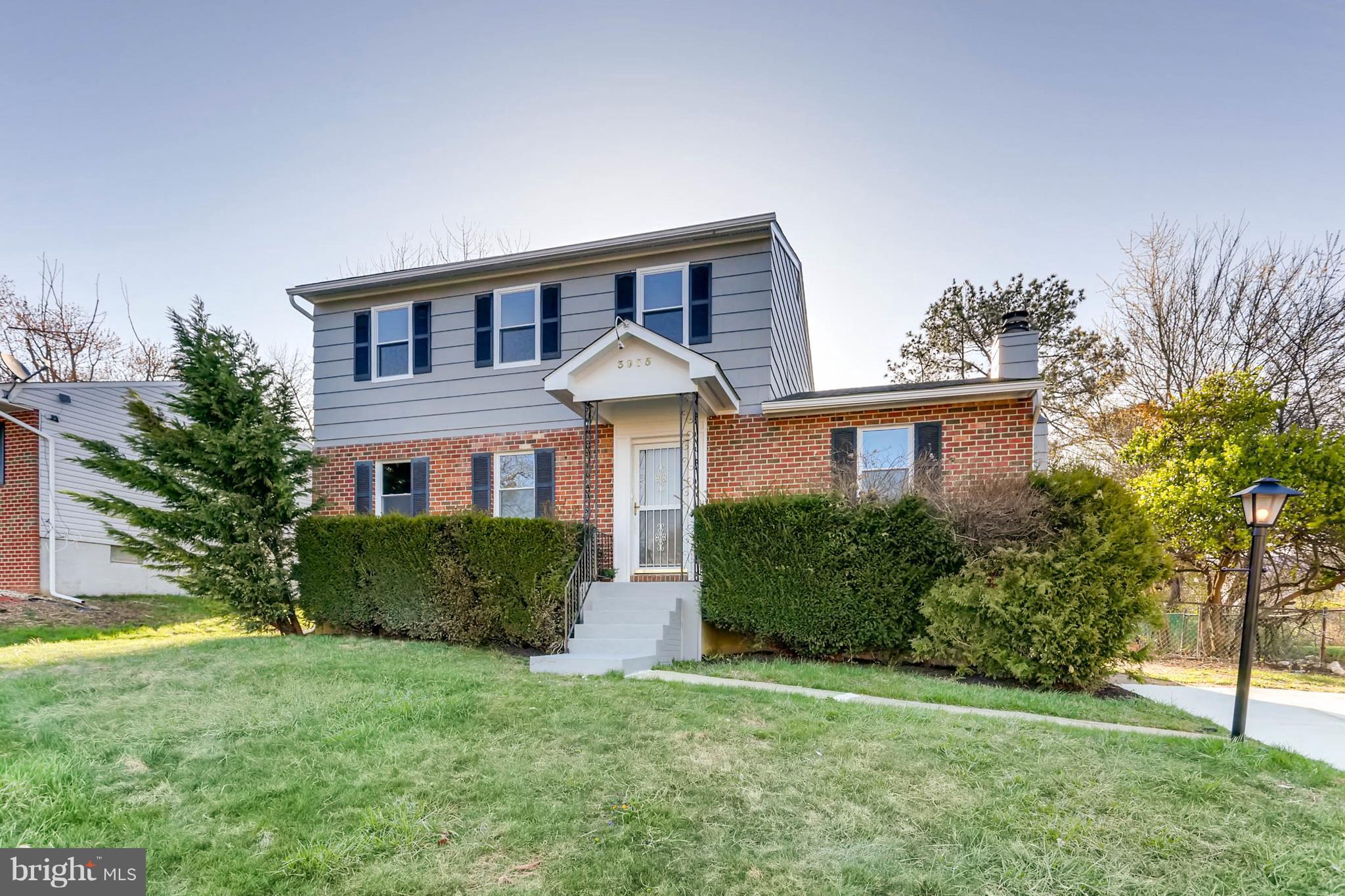 3935 Nemo Road Randallstown, MD 21133 - Photo 3 of 23 a front view of a house with garden