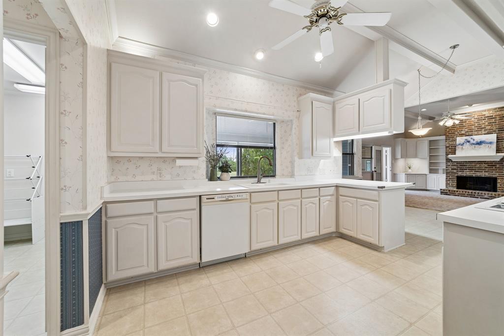 1175 Bloom Street Lucas, TX 75002 - Photo 11 of 36 a large white kitchen with cabinets a sink and appliances