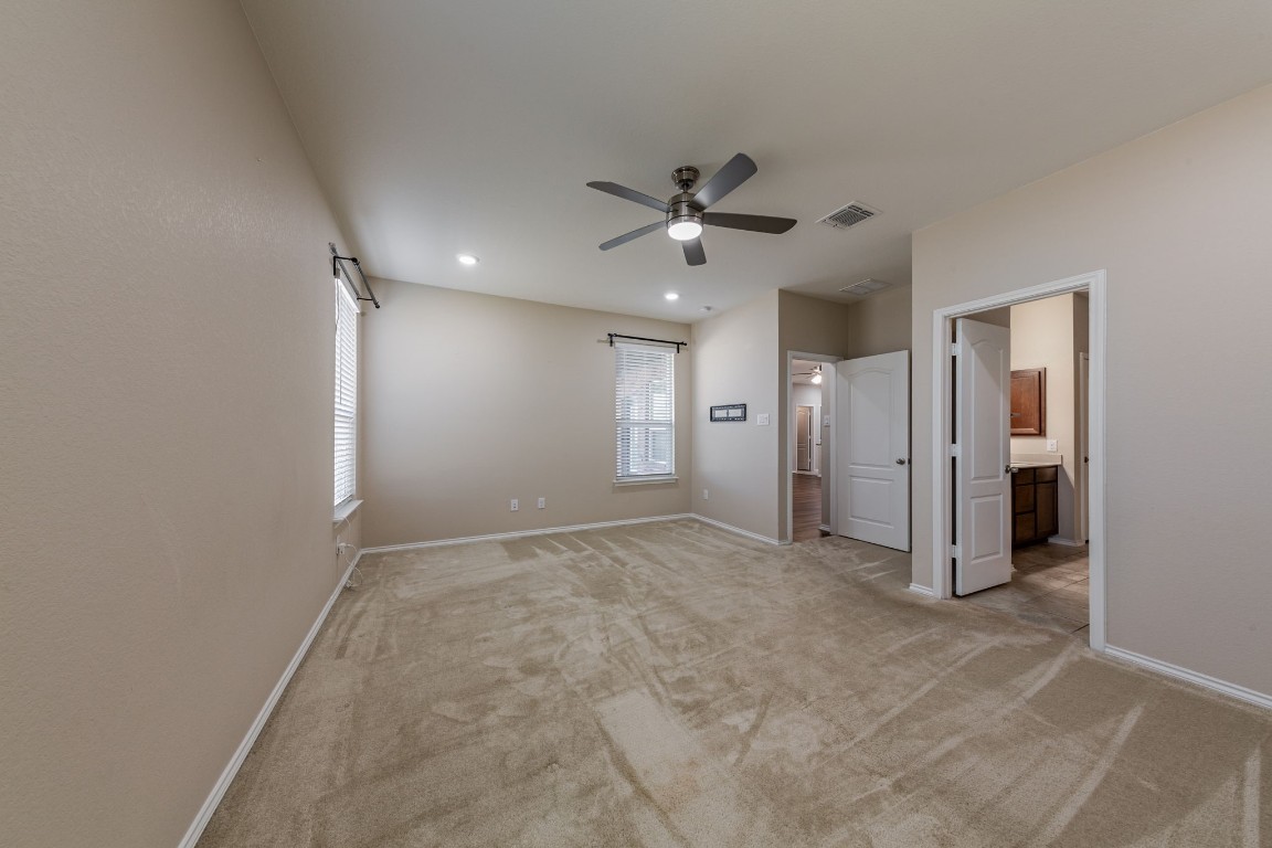 1113 Arbor Acres Loop Leander, TX 78641 - Photo 25 of 34 Primary bedroom