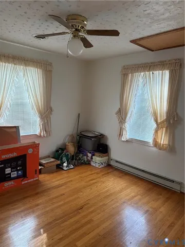 a room with furniture and a fireplace