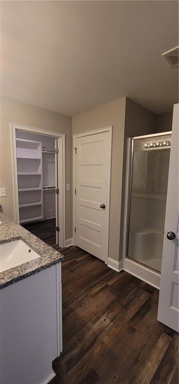 123 Ridge Crest Court Ellijay, GA 30540 - Photo 11 of 34 a bathroom with a granite countertop sink and shower