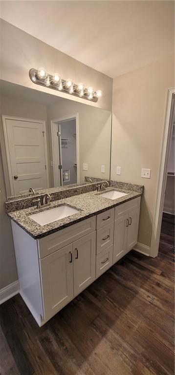 123 Ridge Crest Court Ellijay, GA 30540 - Photo 13 of 34 a bathroom with a granite countertop sink and a mirror