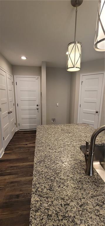 123 Ridge Crest Court Ellijay, GA 30540 - Photo 30 of 34 a bedroom with a bed and a chandelier