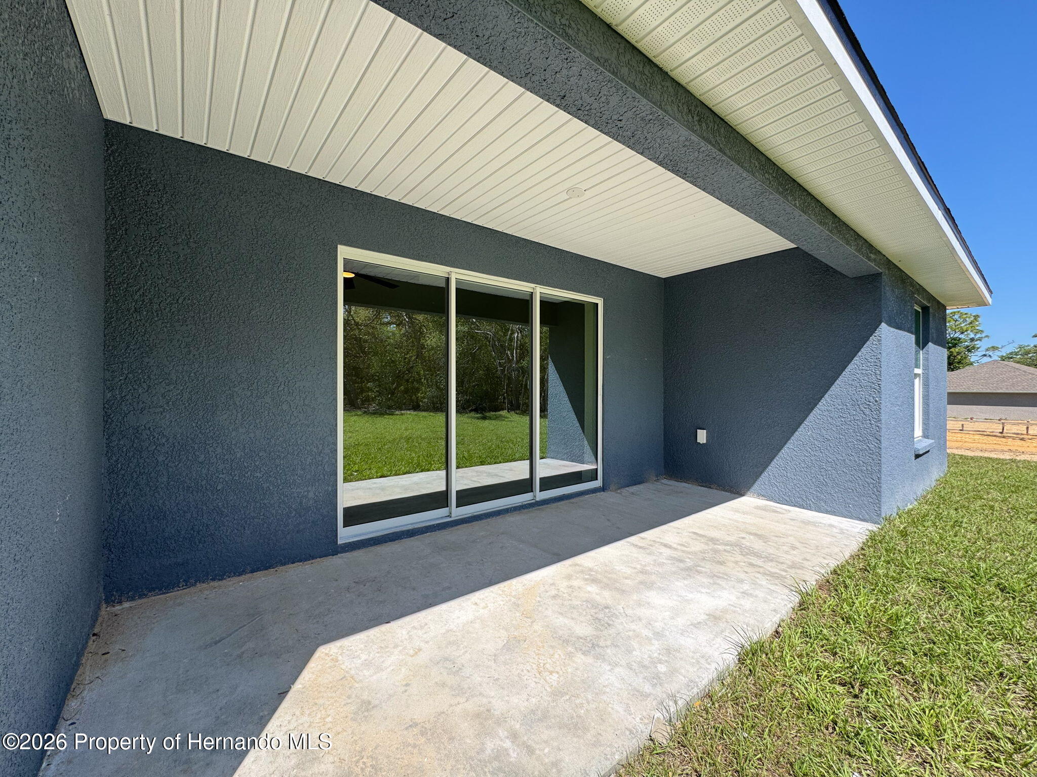 8988 Waterbird Way Weeki Wachee, FL 34613 - Photo 3 of 42 a view of a house with a balcony