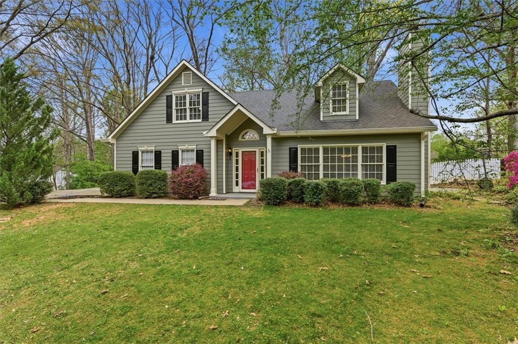 139 Stanbrough Drive Dallas, GA 30157 - Photo 2 of 52 a front view of house with yard and green space