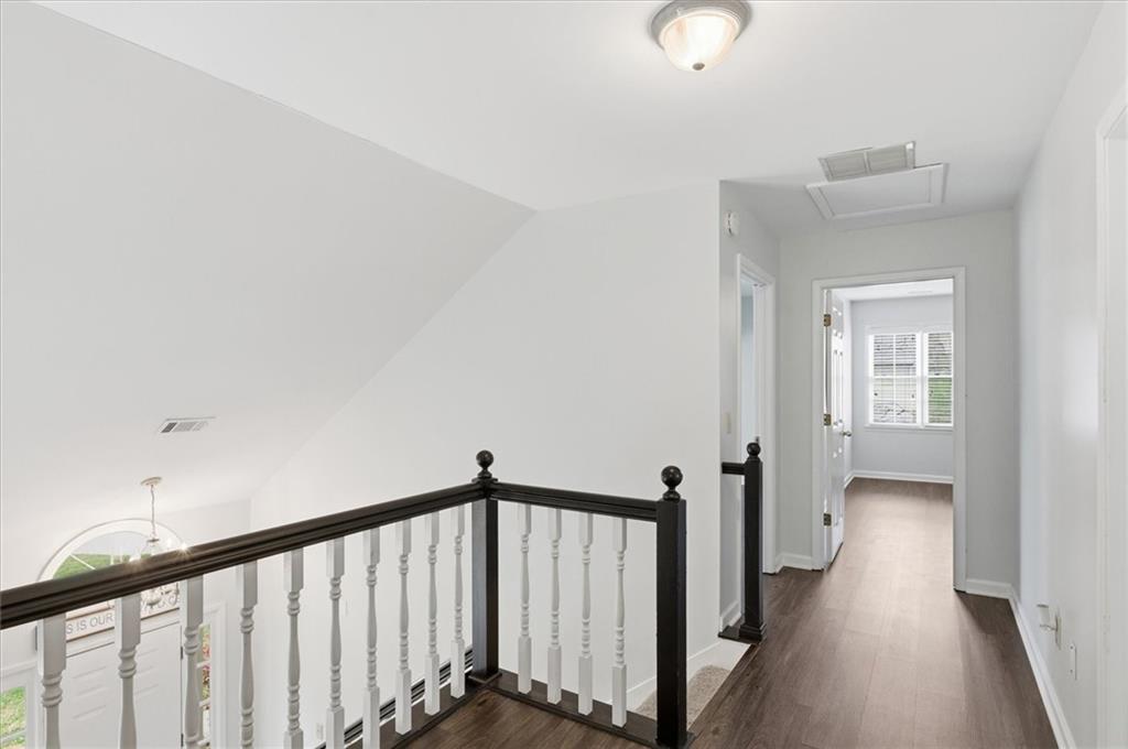139 Stanbrough Drive Dallas, GA 30157 - Photo 26 of 52 a view of a hallway with wooden floor and staircase