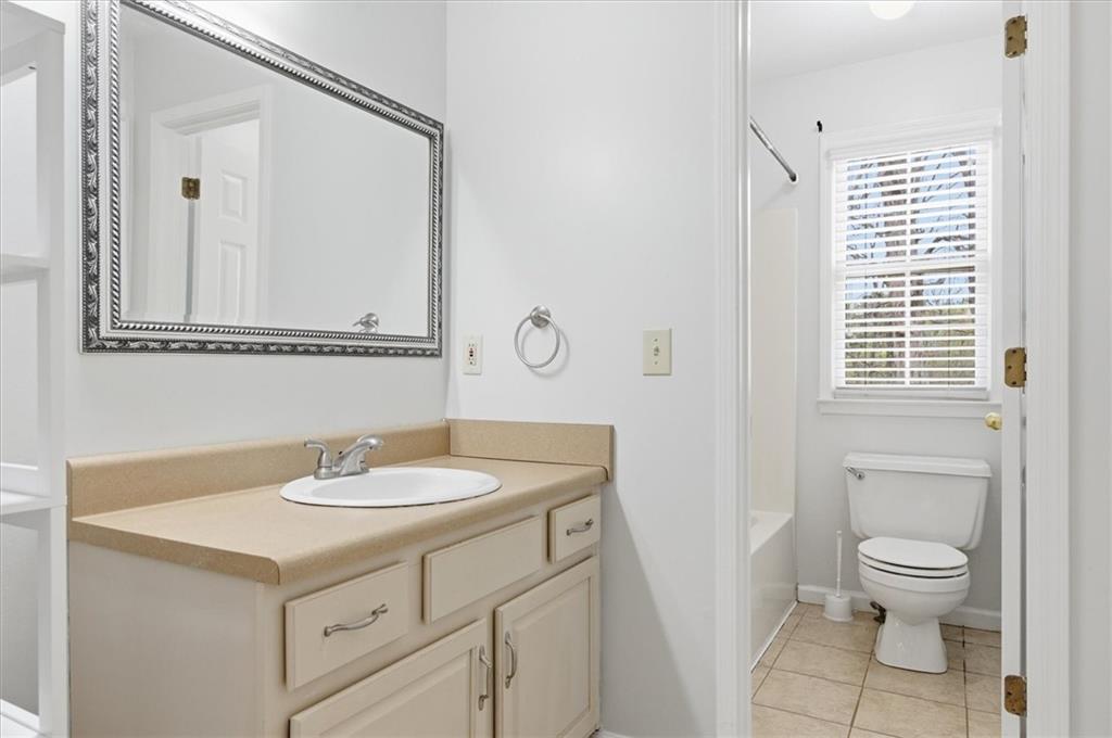 139 Stanbrough Drive Dallas, GA 30157 - Photo 29 of 52 a bathroom with a sink toilet and vanity