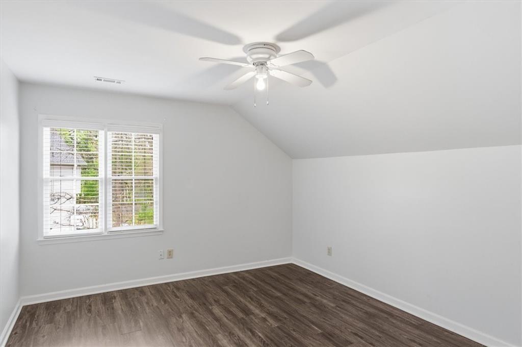 139 Stanbrough Drive Dallas, GA 30157 - Photo 30 of 52 an empty room with a window and a fan