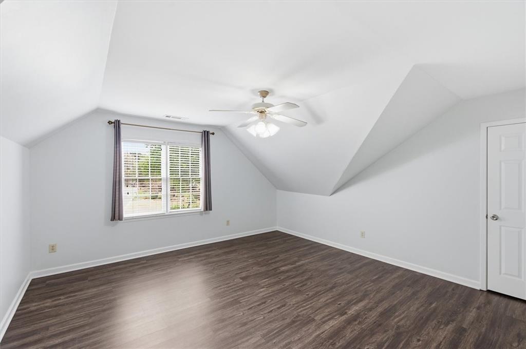 139 Stanbrough Drive Dallas, GA 30157 - Photo 32 of 52 wooden floor in an empty room with a window